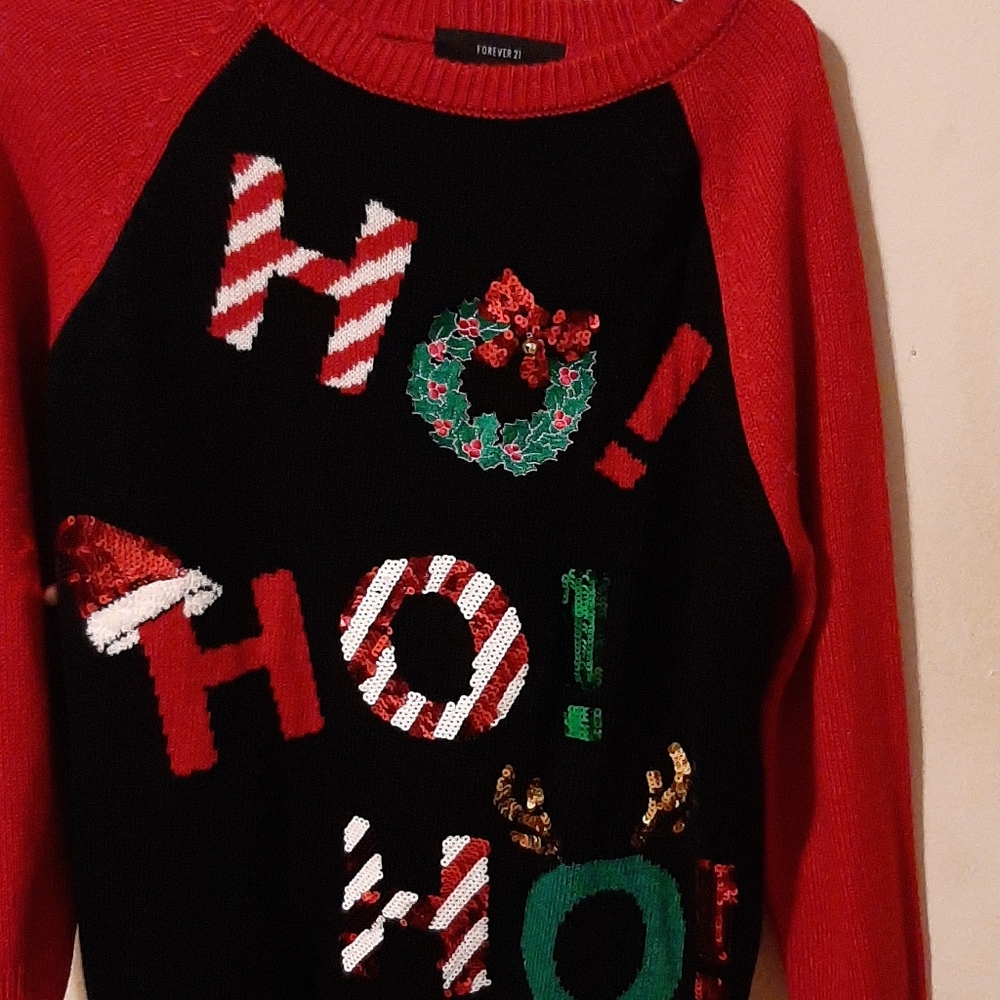 X más sweater